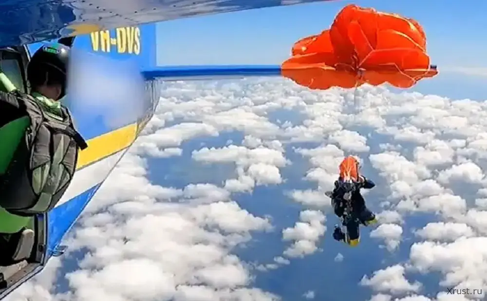 The guy jumped with a parachute and got caught on the tail of the plane